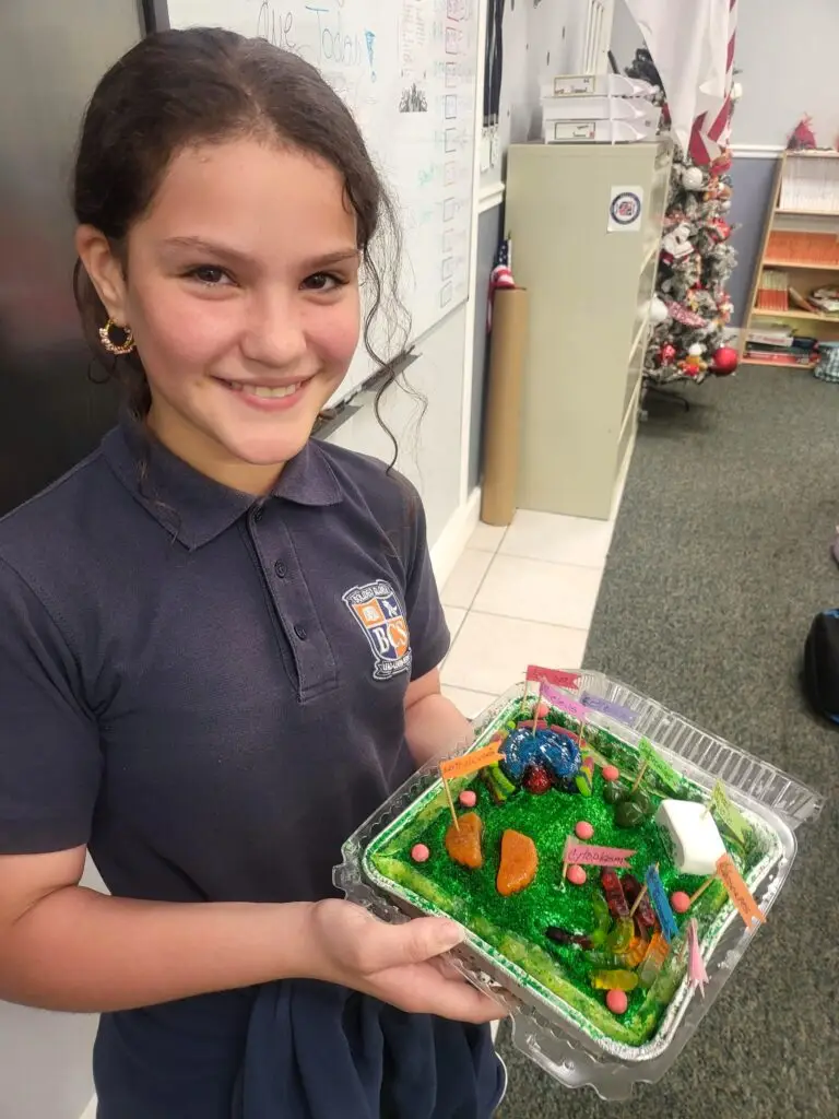 Bethany Christian School elementary student displays hands-on science project during classroom lab activity.