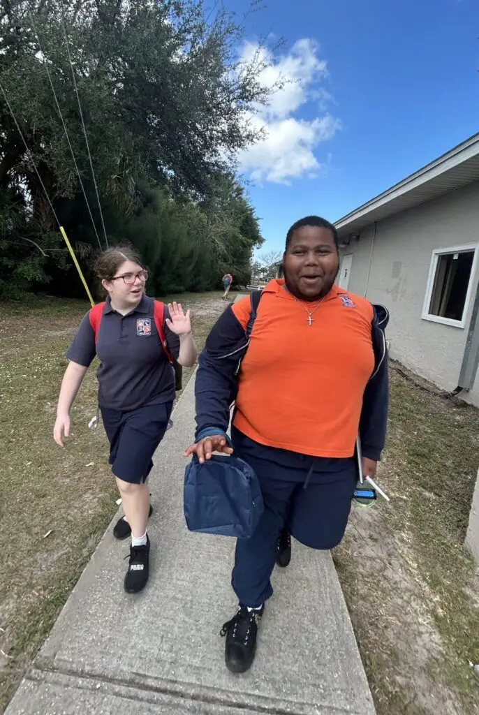 Bethany Christian School high school students walking together outside on campus.