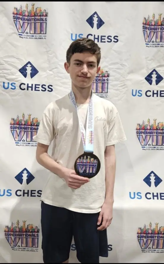 Bethany Christian School student earning a medal at the SuperNationals US Chess tournament.