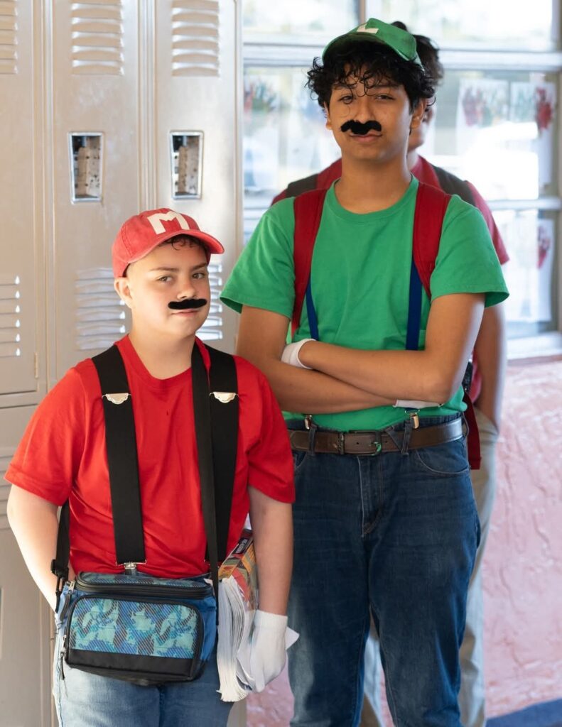 Bethany Christian School middle school boys dressed as Mario and Luigi during Spirit Week, showcasing fun and creativity.